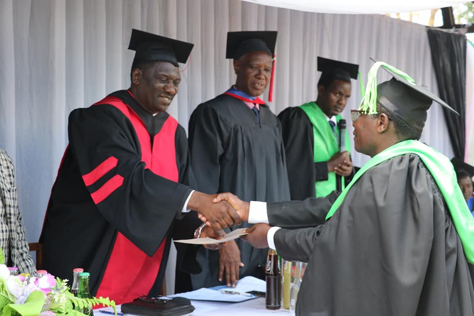 Bishop conferring certificate