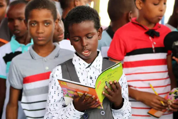 Kids reading the Bible together